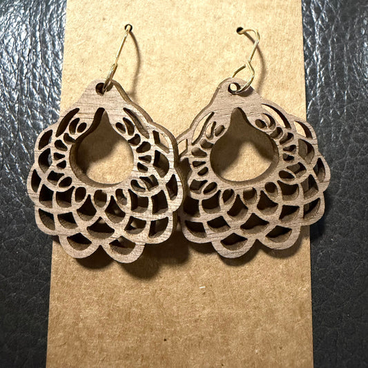 Scalloped circle style earrings shown from another angle