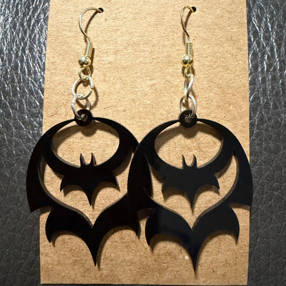 Small bat Halloween earrings displayed as a pair