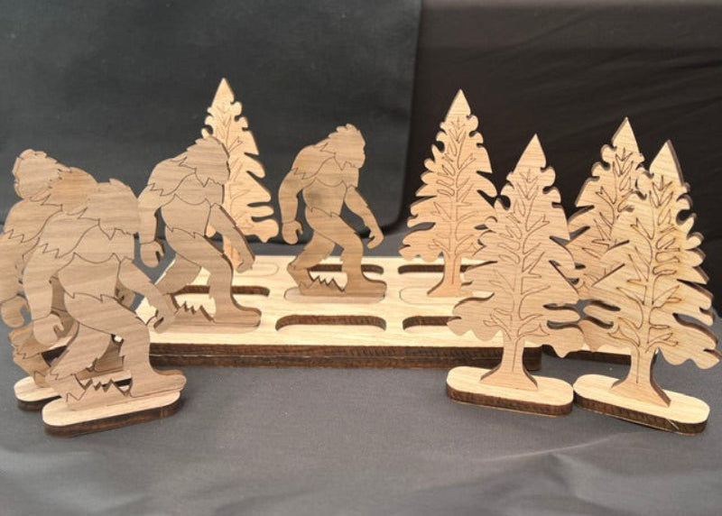 Wooden laser-cut figures of Bigfoot and trees tic tac toe game