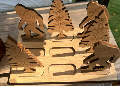 Wooden Bigfoot and trees tic tac toe game