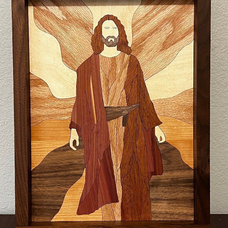 Handcrafted wood art depicting Jesus walking, formed entirely from natural wood grain, 14x11 inches, framed in walnut