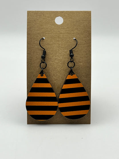 Black and orange teardrop earrings with UV printed stripe design