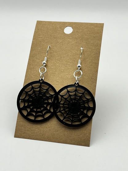 Small round black acrylic cobweb-shaped earrings