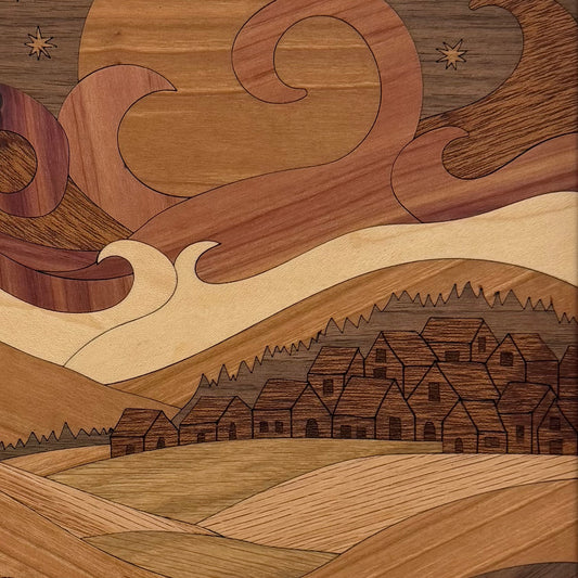 Close-up of the inlaid wood village houses tucked into the hills on the Little Houses wall art