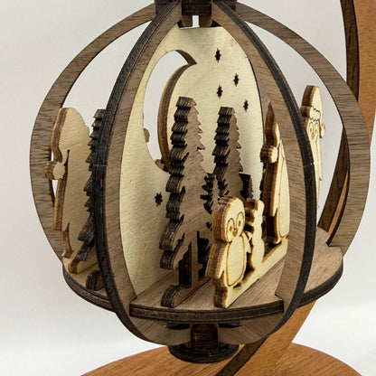 Detail view of the 3D Penguins Family wood ornament design