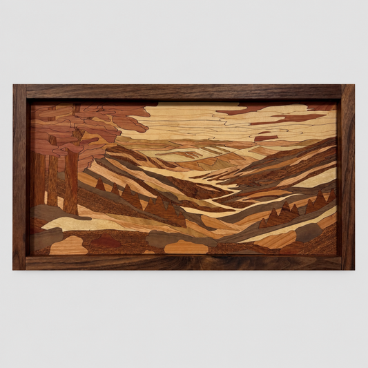 Rolling Mountains wood inlay wall art in a solid walnut frame, with layered mountains and forest in eight natural wood tones