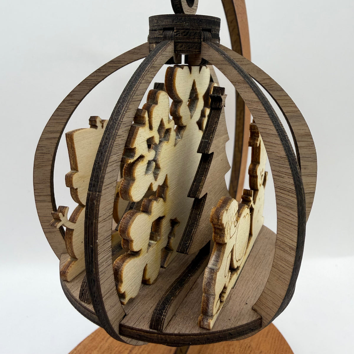 Detail view of the 3D Snowman and Penguin wood ornament design