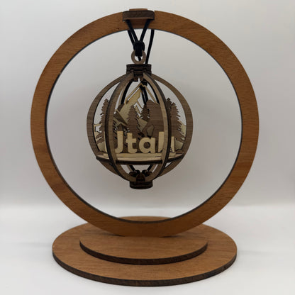 3D Bigfoot Utah wood ornament shown in a display stand