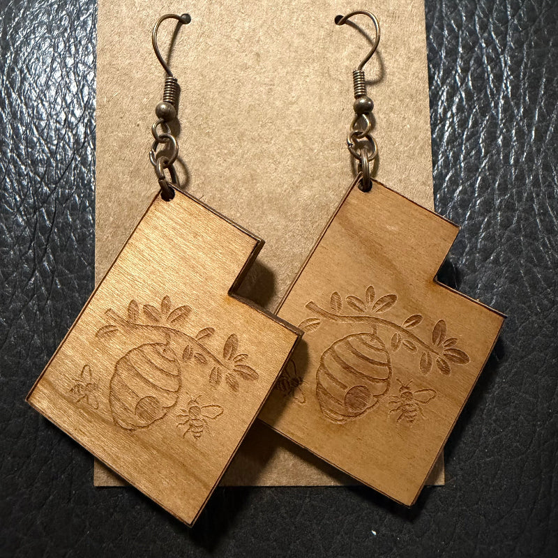 Utah shaped earrings with engraved beehive in cherry wood