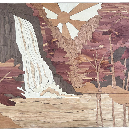 Handcrafted wooden wall art of a forest waterfall scene, 24x17 inches, made from maple, walnut, cherry, oak, mahogany, and cedar