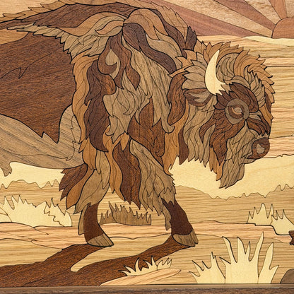 Intricately carved wooden wall art depicting a bison in a prairie landscape, crafted from various natural wood tones.