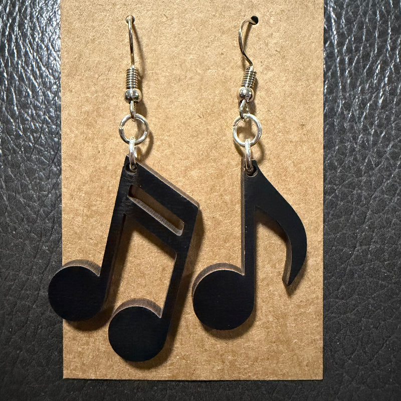 Music note wood earrings displayed as a pair