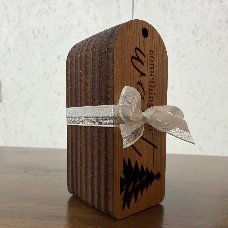 stack of 8 gift tags bundled with a ribbon tied around them
