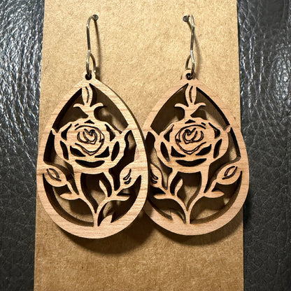Close-up detail of rose cut wood earring design