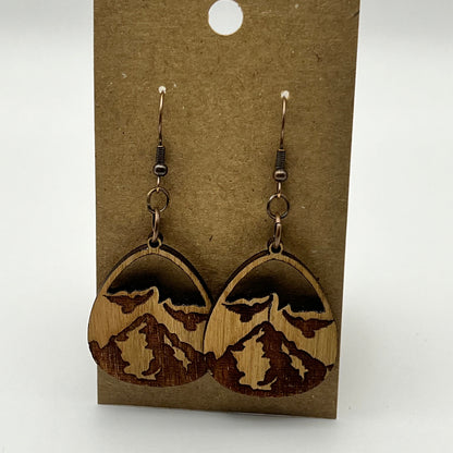 Cherry wood teardrop earrings with laser-cut mountain design