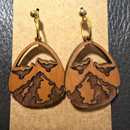 Close-up detail of teardrop mountain wood earring design