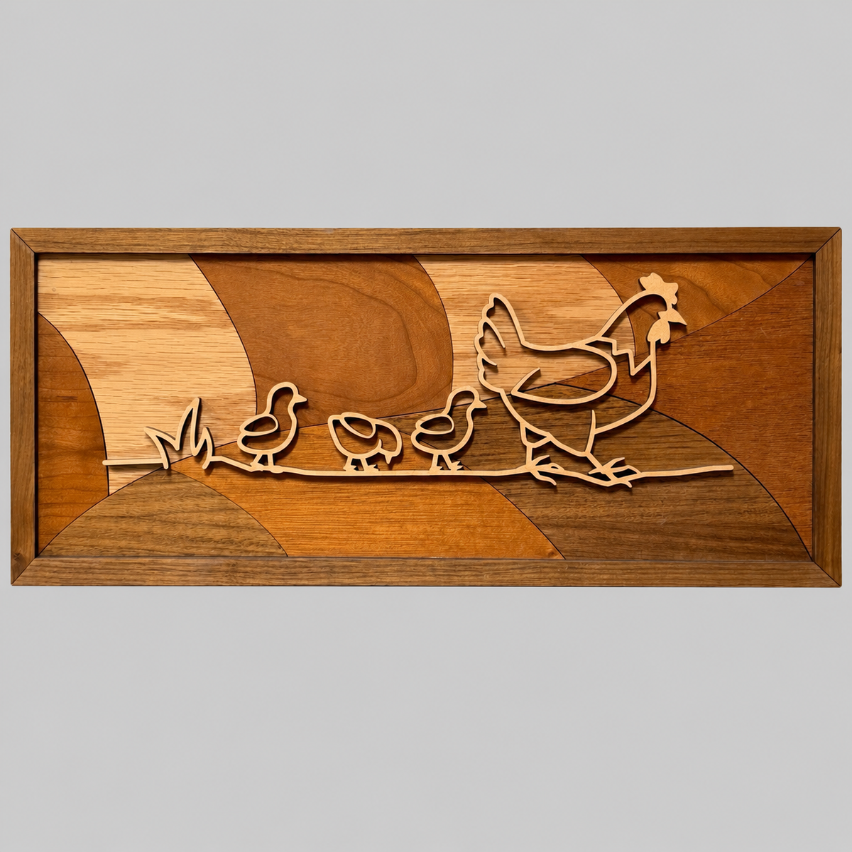 Chickens line art with a maple hen and chicks over a Curved Horizon inlaid wood backer in a hardwood frame