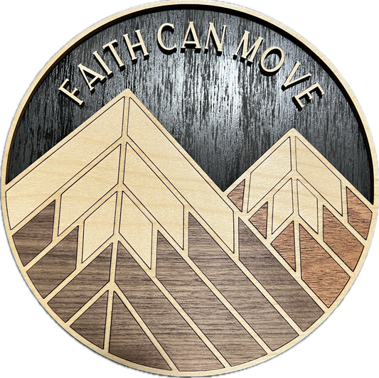 Faith Can Move Mountains 9-inch round wood sign with maple, walnut, and mahogany mountains against a black background