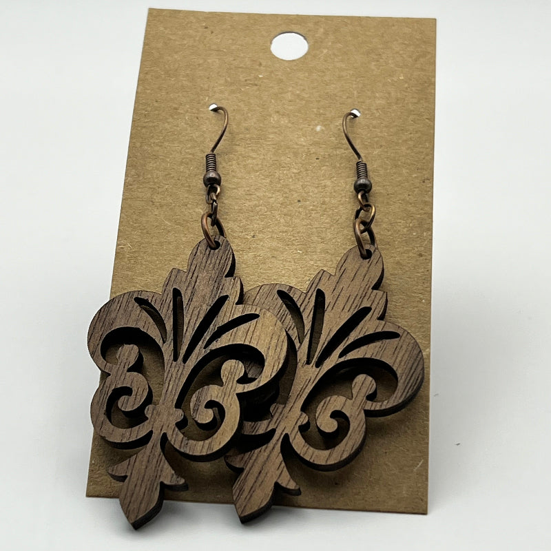 Wood earrings with laser-cut fleur-de-lis design in cherry or walnut