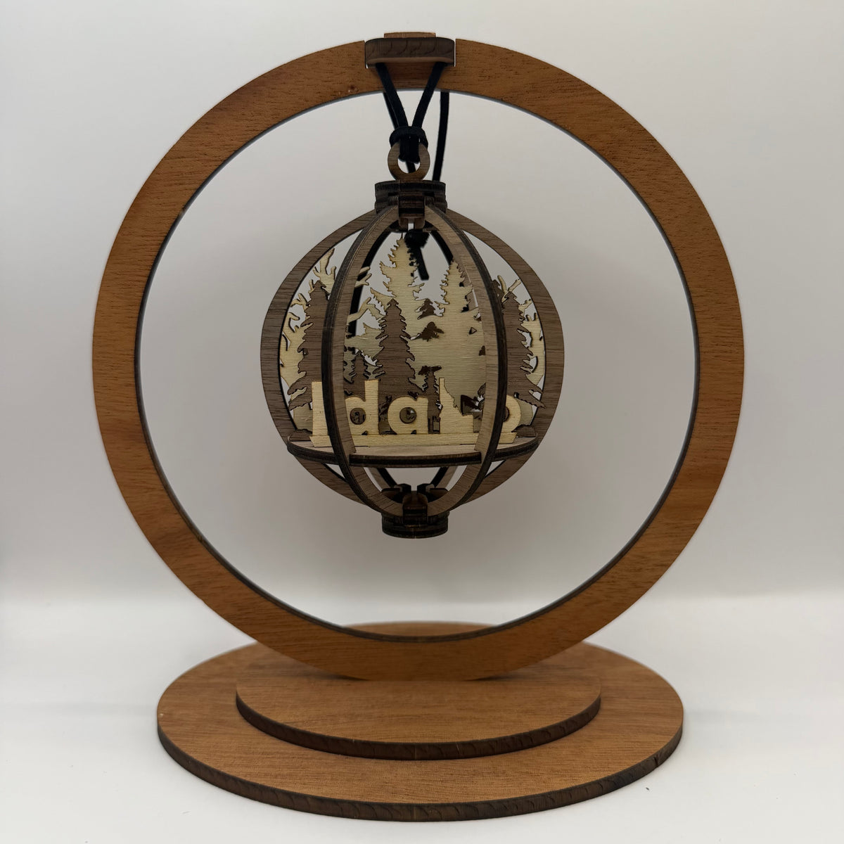 3D Idaho wood ornament shown in a display stand