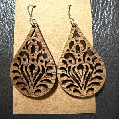 Teardrop cut wood earrings shown from another angle