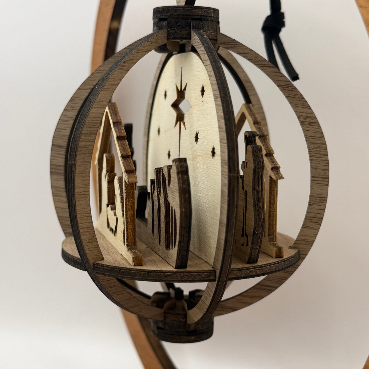 Detail view of the 3D Nativity wood ornament design