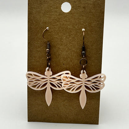 Iridescent acrylic dragonfly-shaped earrings in yellow, pink, and red