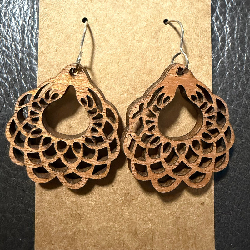 Close-up detail of scalloped circle style earring design