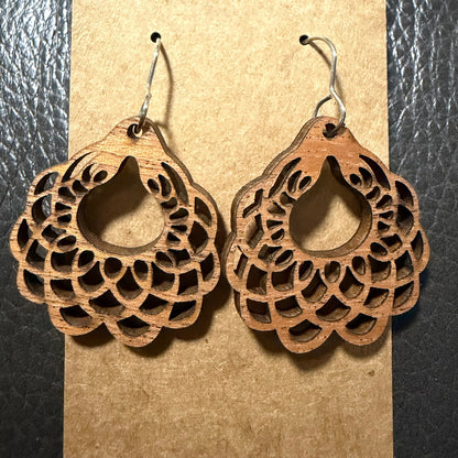 Close-up detail of scalloped circle style earring design