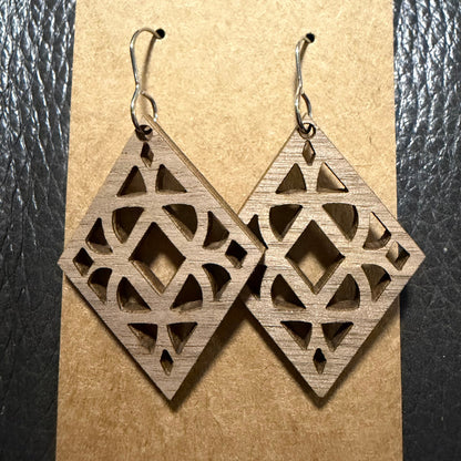 Close-up detail of diamond wood earring grain