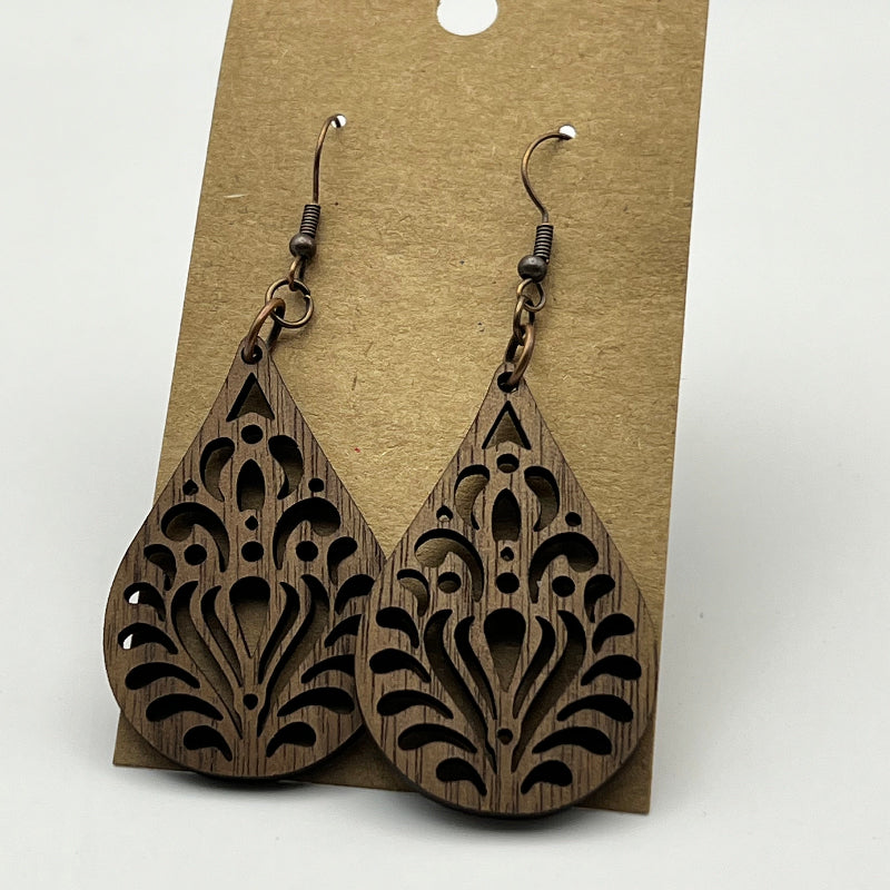 Teardrop-shaped wood earrings in cherry or walnut, single layer design