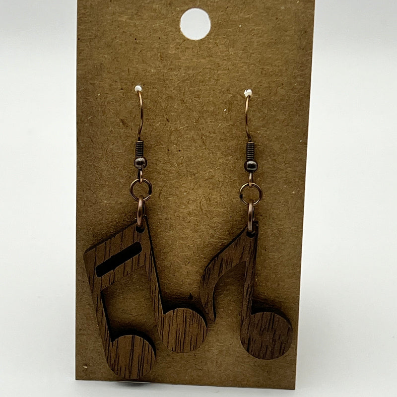Laser-cut wood earrings shaped like eighth and sixteenth music notes
